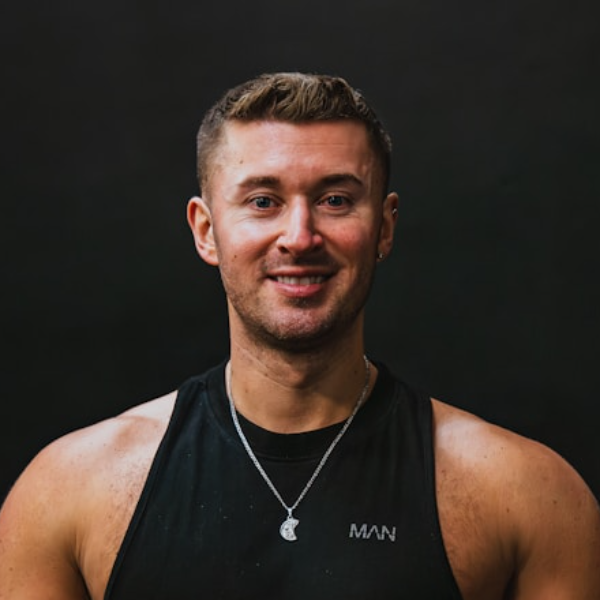 Coach portrait — photo by Samuel Girven on Unsplash